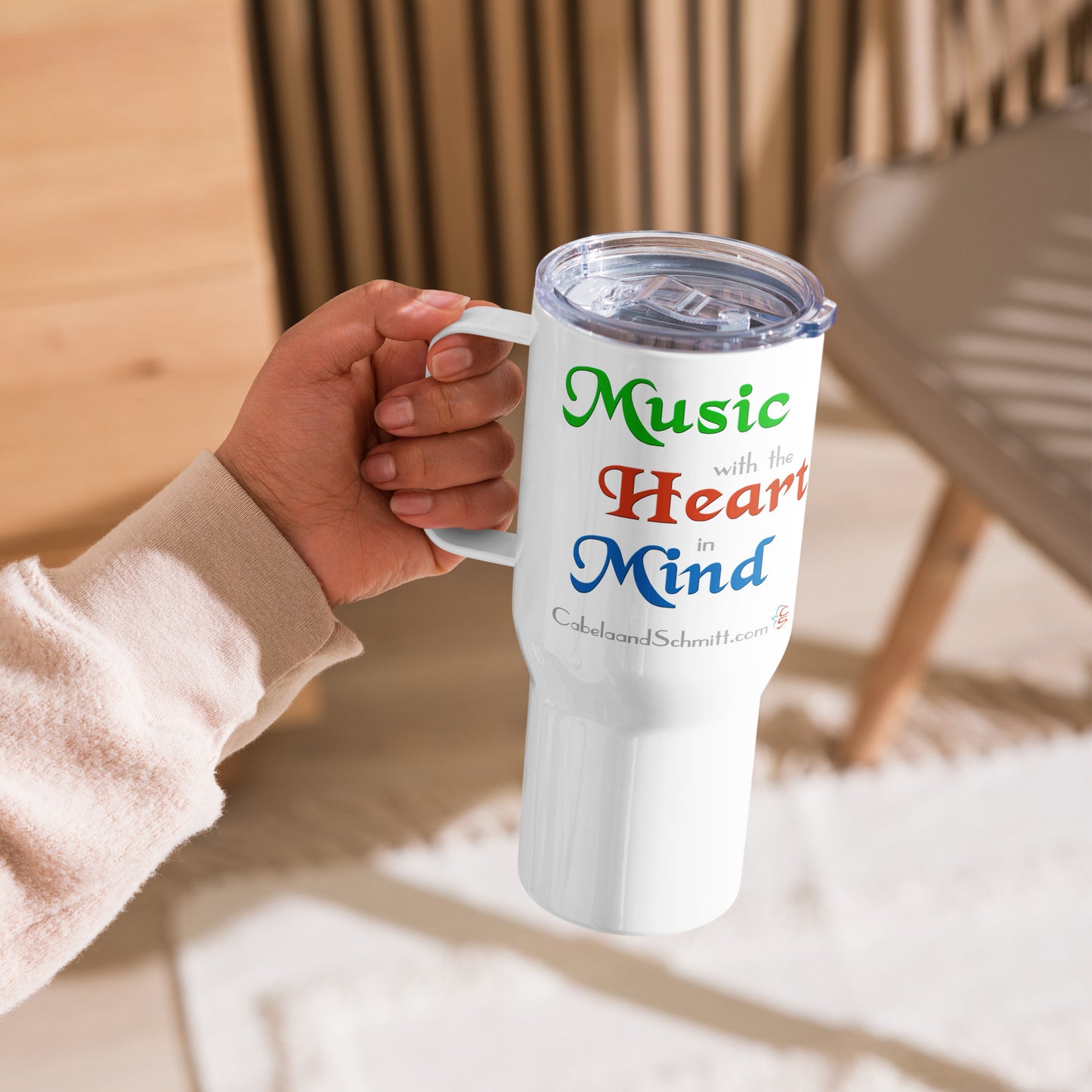Travel mug with a handle "Music with the Heart in Mind"