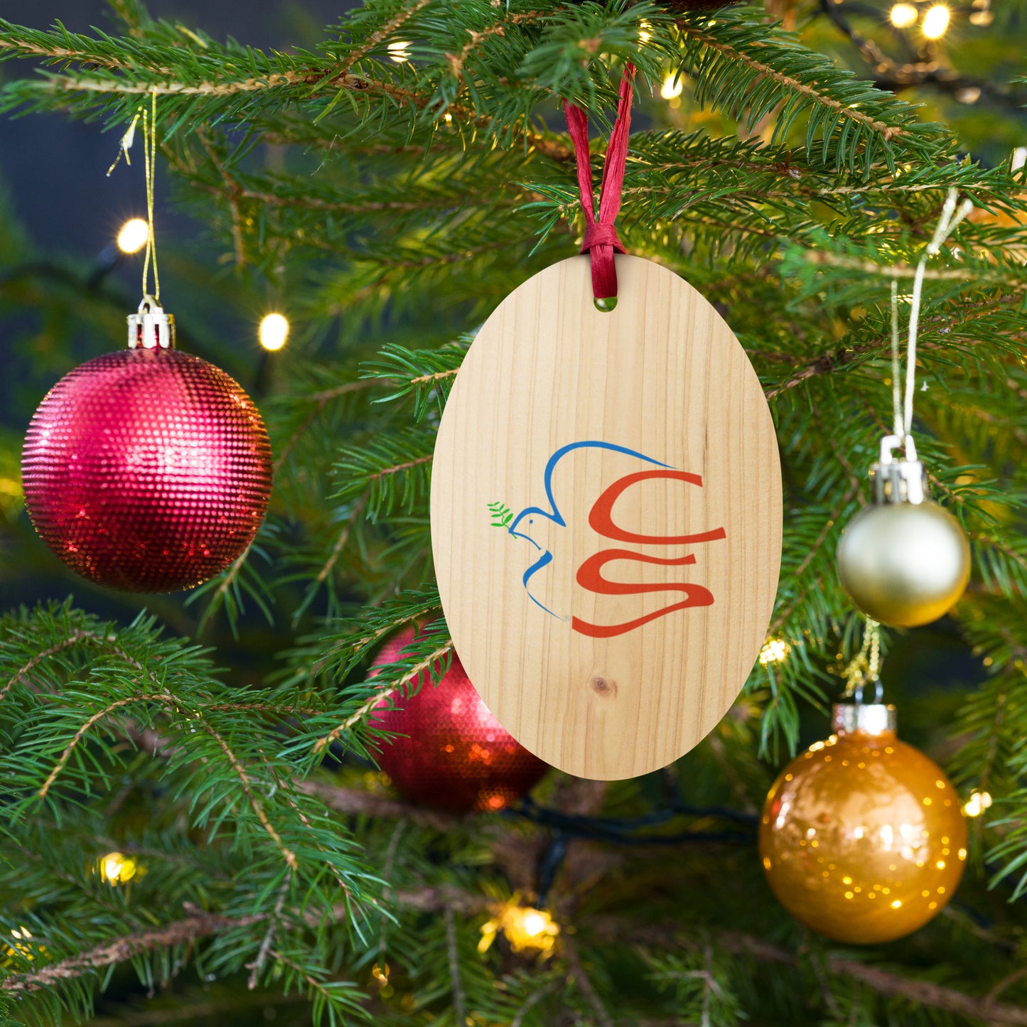 Wooden ornaments with Cabela and Schmitt logo