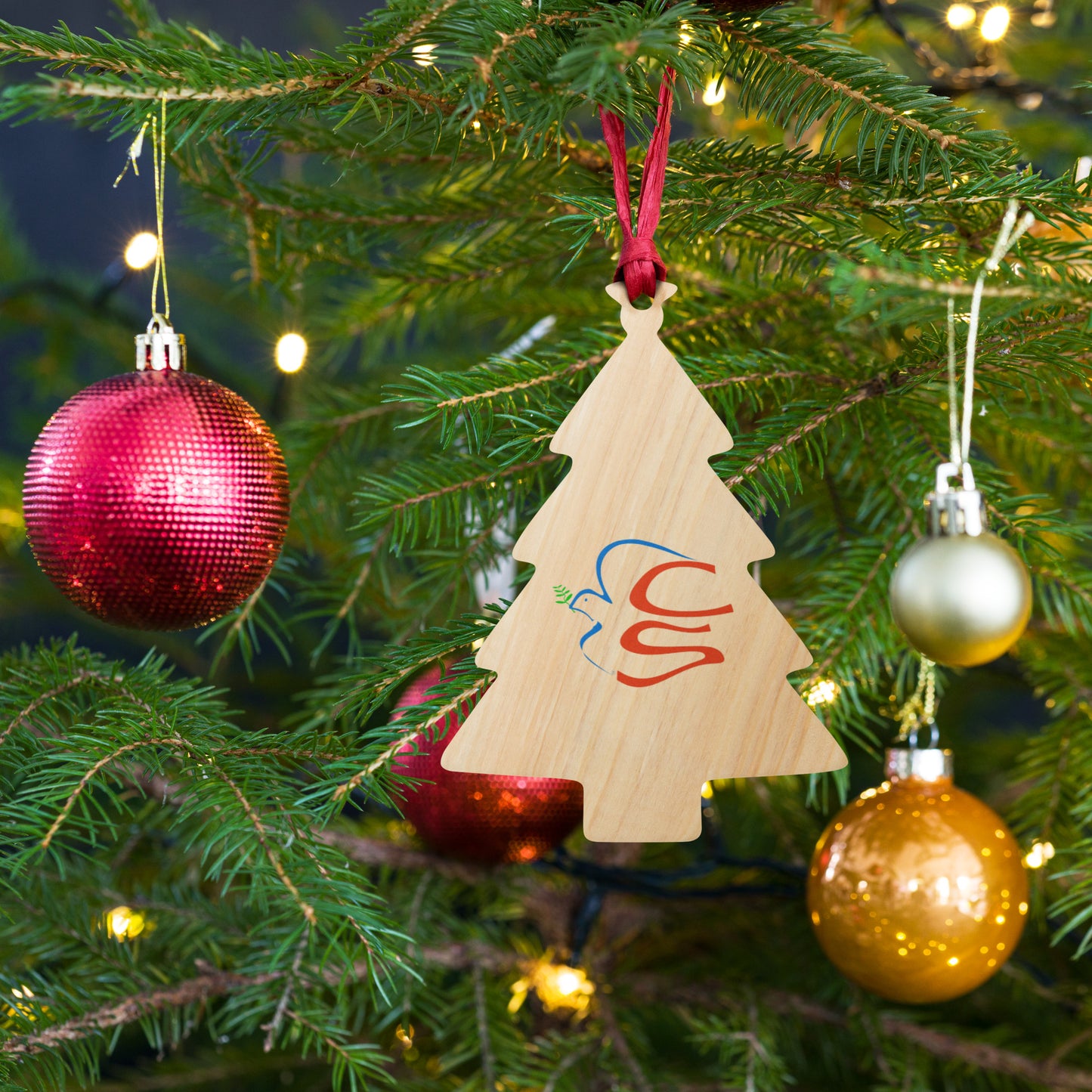 Wooden ornaments with Cabela and Schmitt logo
